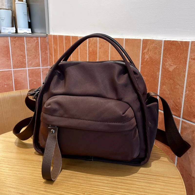 达芙世家牛津布轻便包包2025新款百搭休闲时尚手提单肩女士斜挎包