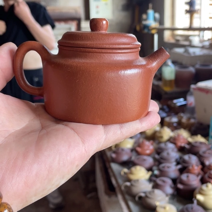 紫砂紫砂德钟。  红将坡。  （微暇