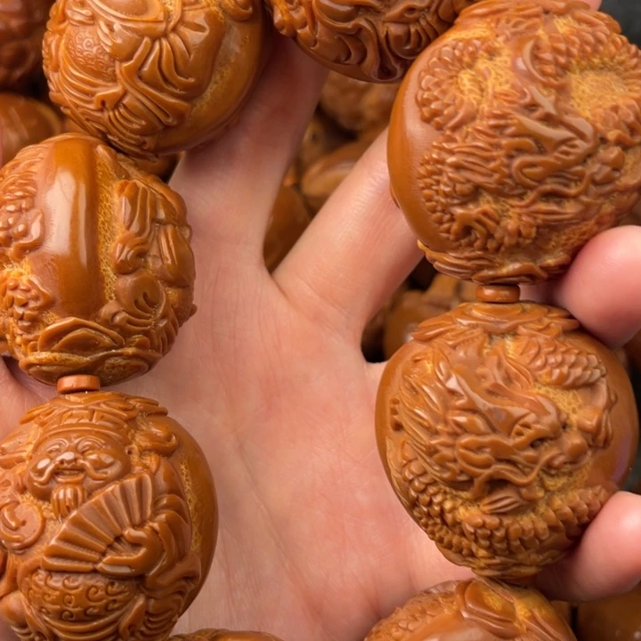 橄榄核吊坠简**?橄榄核