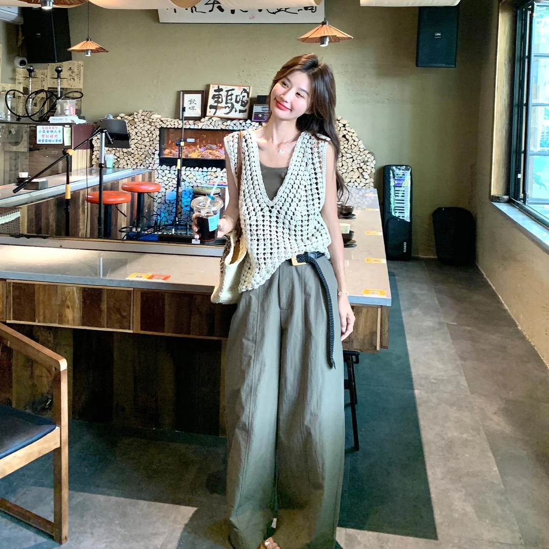 浅绿色又酷又飒休闲套装女2025夏季针织镂空马甲背心阔腿裤三件套