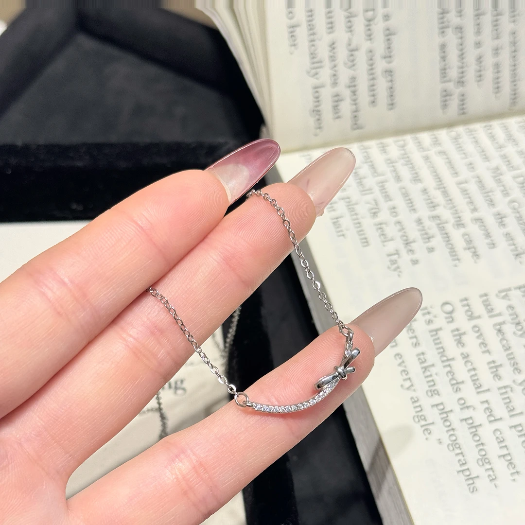 温柒 钛钢项链 微笑蝴蝶结项链轻奢小众时尚百搭高级设计感锁骨链