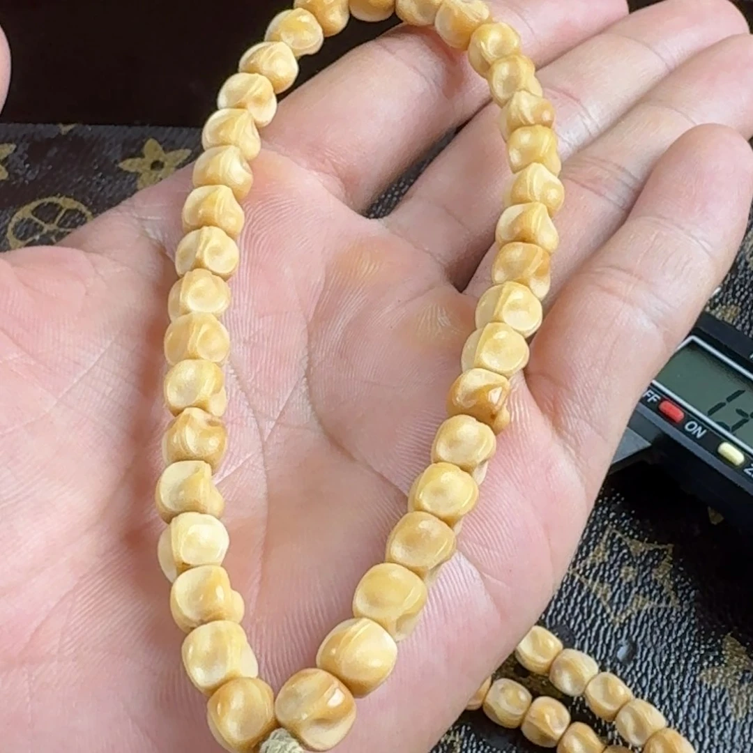 龙眼菩提吊坠手串