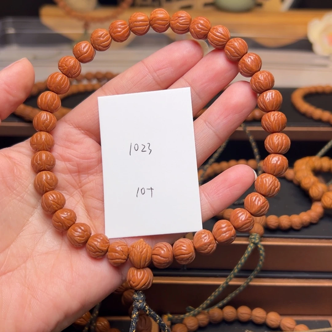 用***5木质类秦岭龙纹桃核手持10+