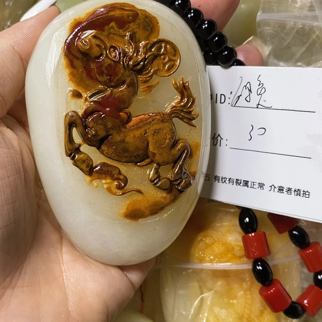 石材得**子古青石手把件