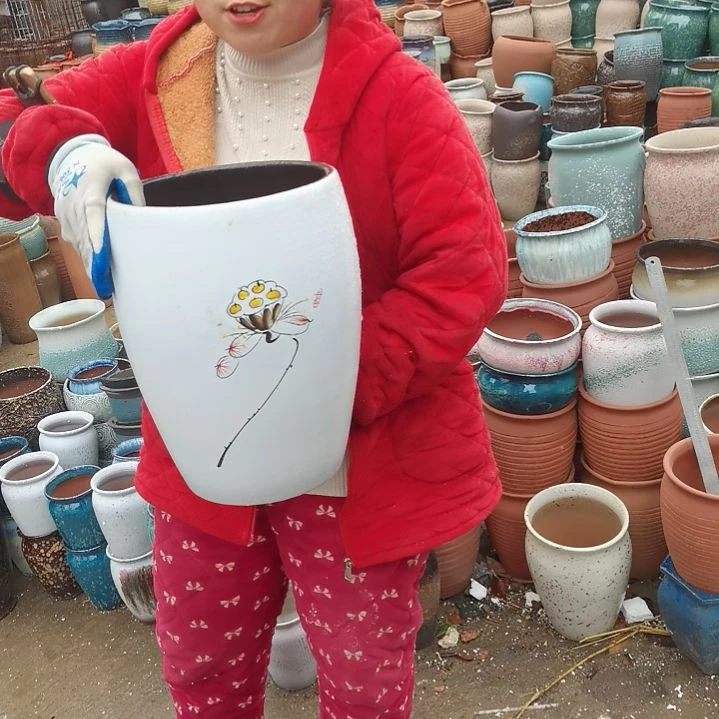 红陶口23高33瑕疵