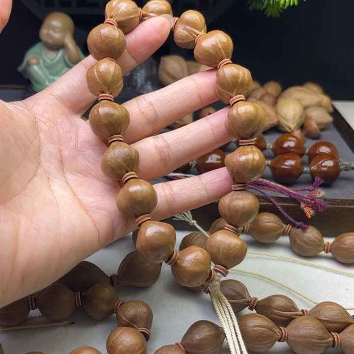 相***签手串/手链橄榄核1.6*1.7原皮三花蒜头铁核