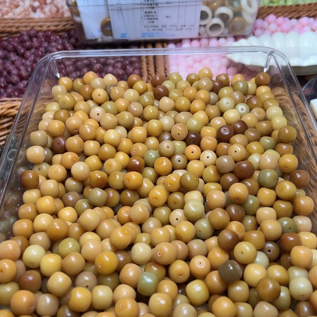 菩提根/象牙果吊坠卡14鸡油黄桶100颗