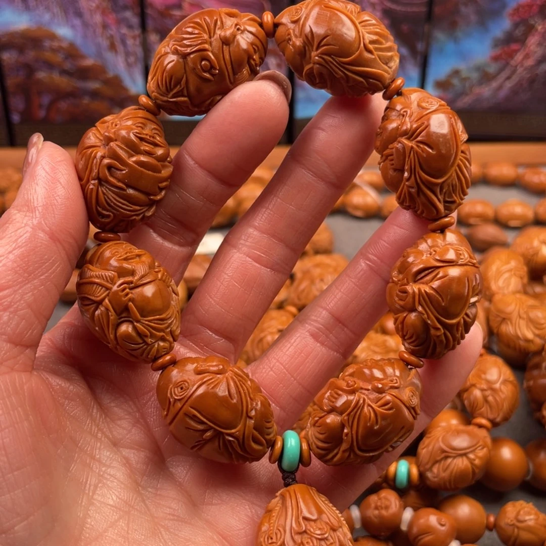 橄榄核手串%**哲油核财神