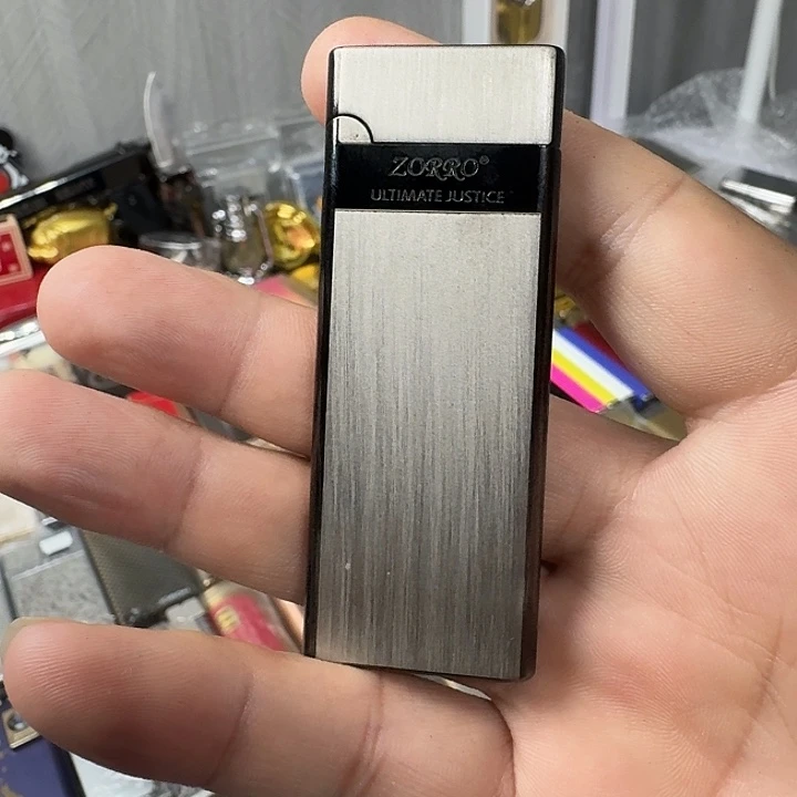 夏***阳佐罗超薄沙轮明火充气打火机