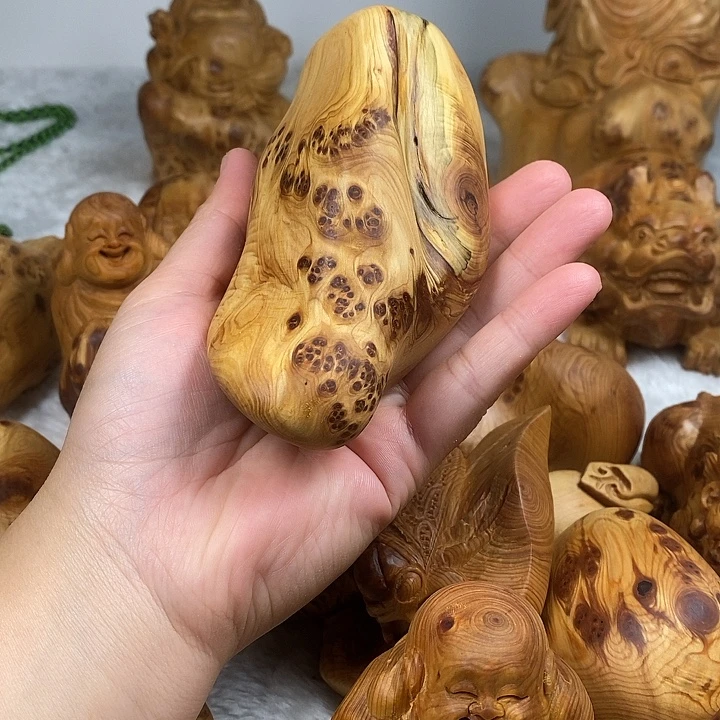 柏木随行瘤疤手把件