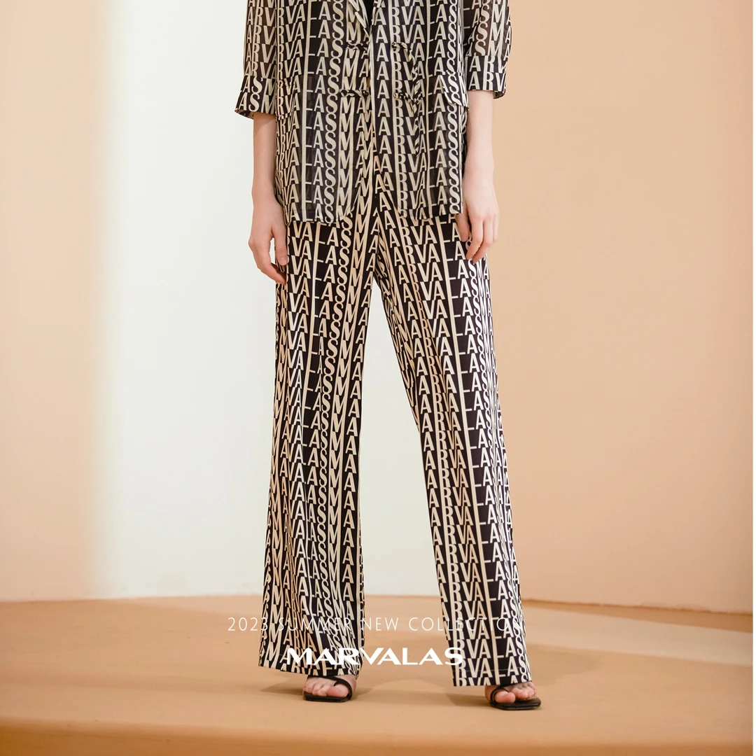 【小余专属】M102304351曼德诗复古满印休闲裤黑白自然腰阔腿裤