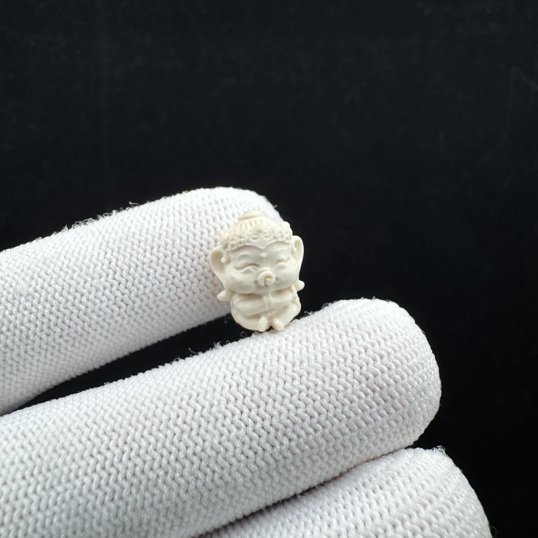K8711天然猛犸牙 雕刻象神小配饰11.5*13.5mm一物一图 假一罚十
