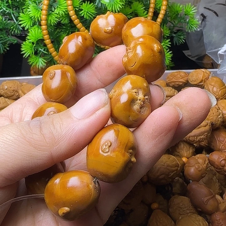 五***登橄榄核雕刻手串开心