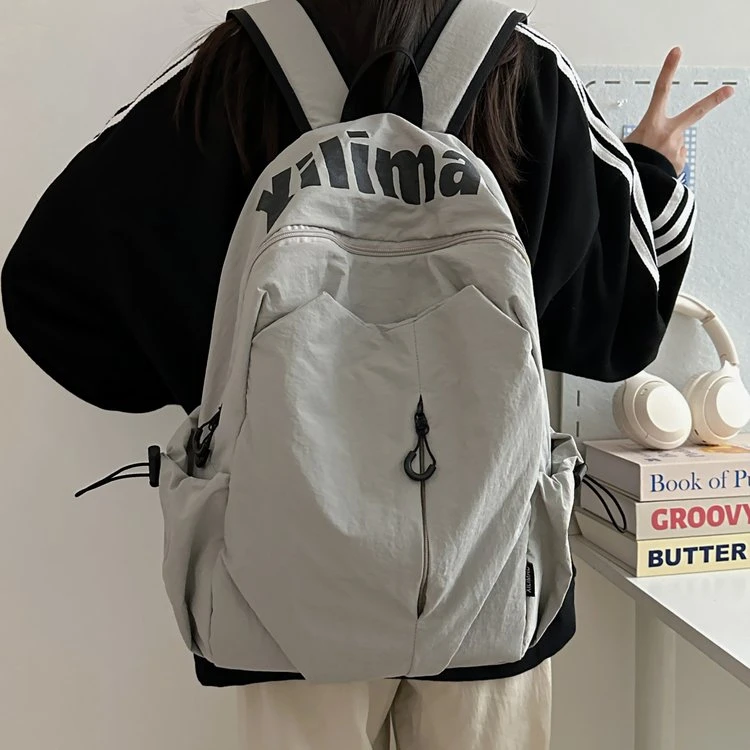 日系简约韩版书包女高中休闲初中女生大容量双肩包旅游轻便背包