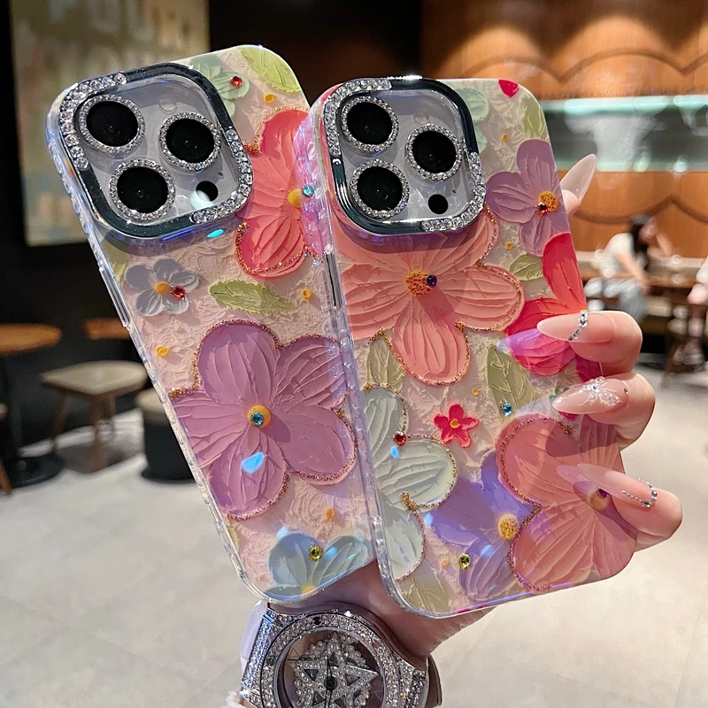 适用苹果系列iPhone16新款手机壳草莓粉紫花钻石镜框闪钻镜头膜壳