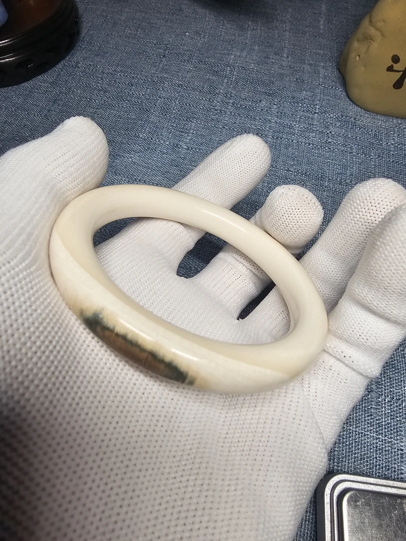 天然猛犸牙1.0圆条蓝眼睛满纹手镯56圈口