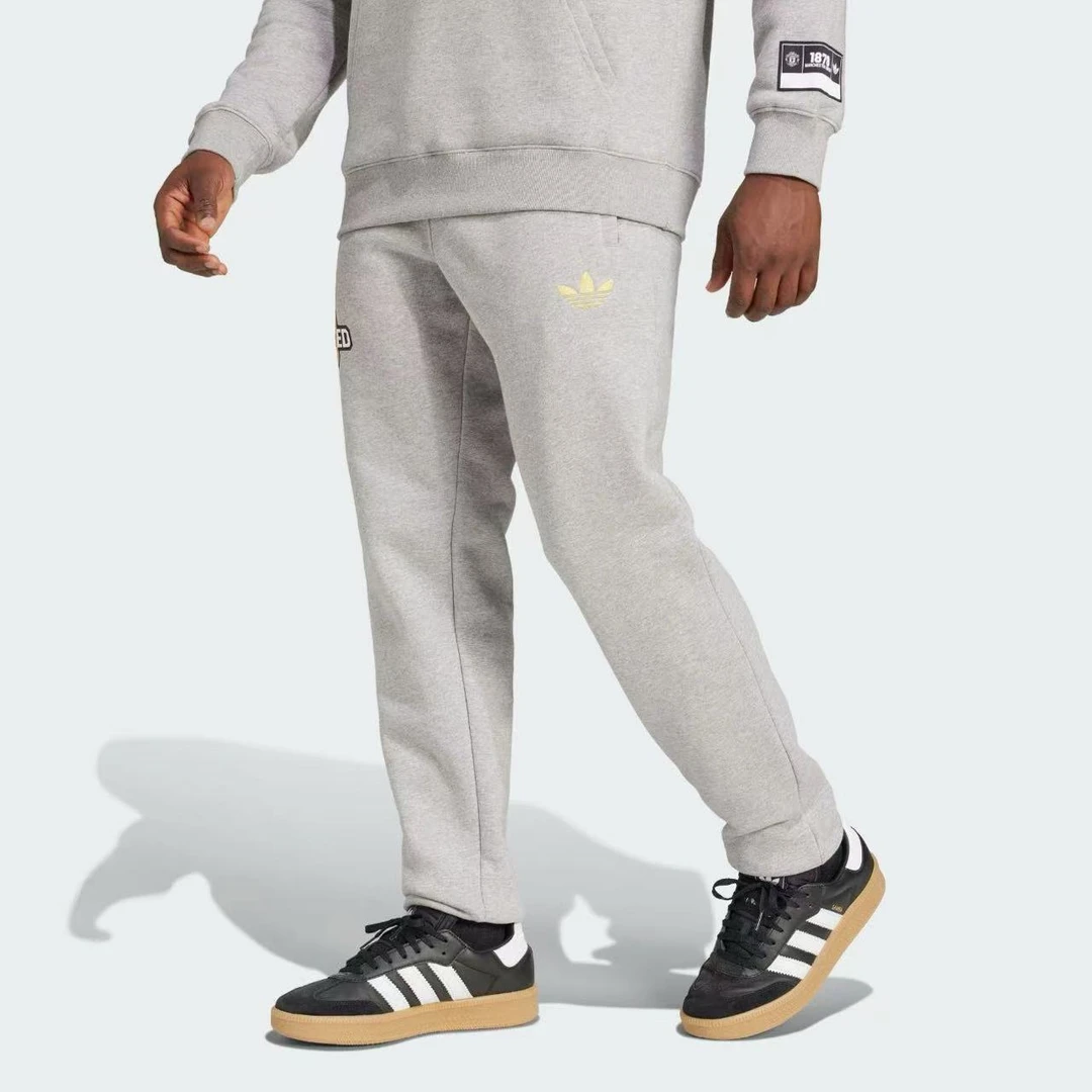 adidas/阿迪达斯 【门店同款】男子曼联足球休闲文化运动长裤JF0367