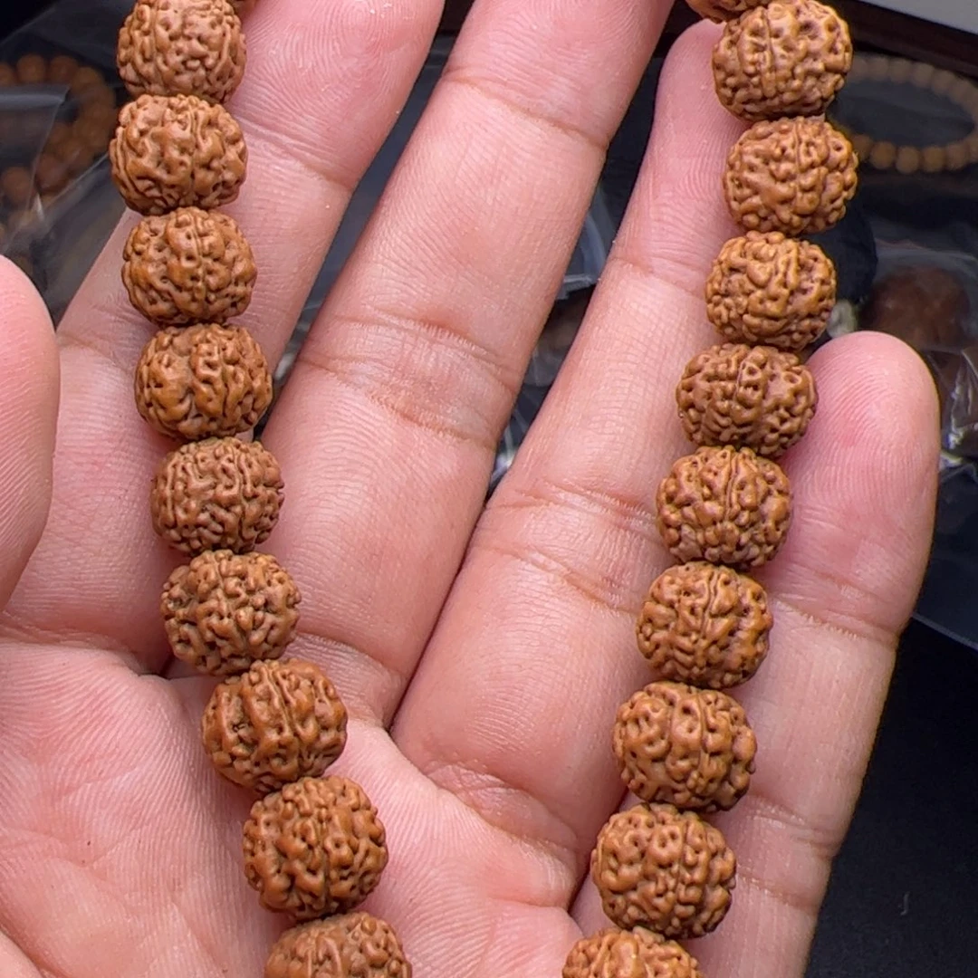 珍***人猴头核桃吊坠噢距离