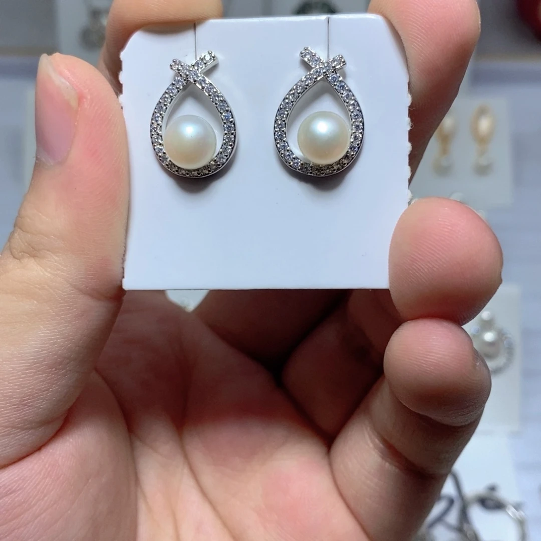 淡水珍珠银S925镶嵌耳饰