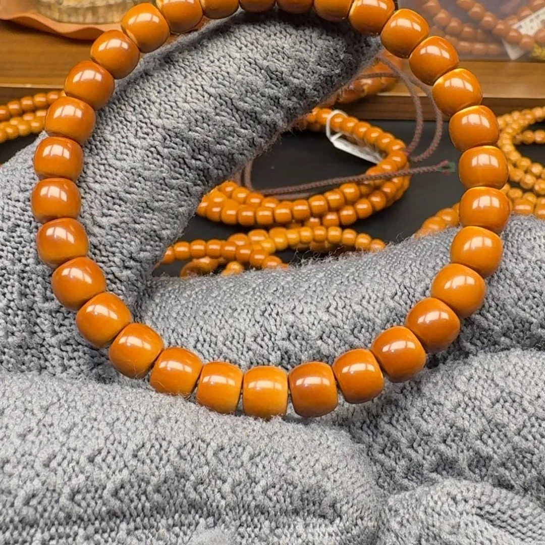 知***。手串/手链橄榄核7,3老挝核尖单圈微白