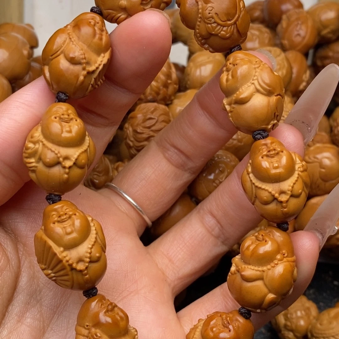 橄榄核手串开心米勒