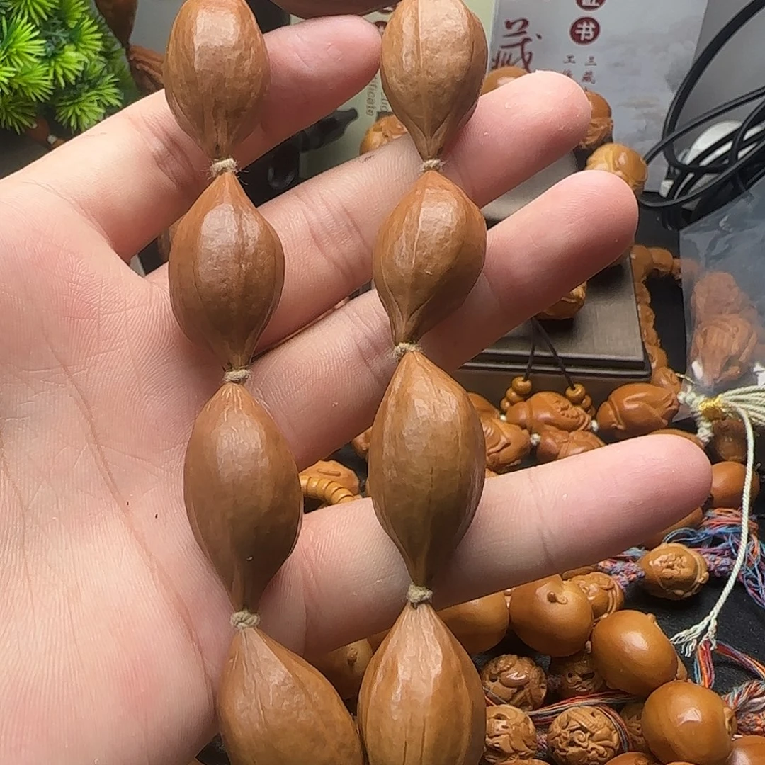 颢***玮橄榄核手串/手链素核福利