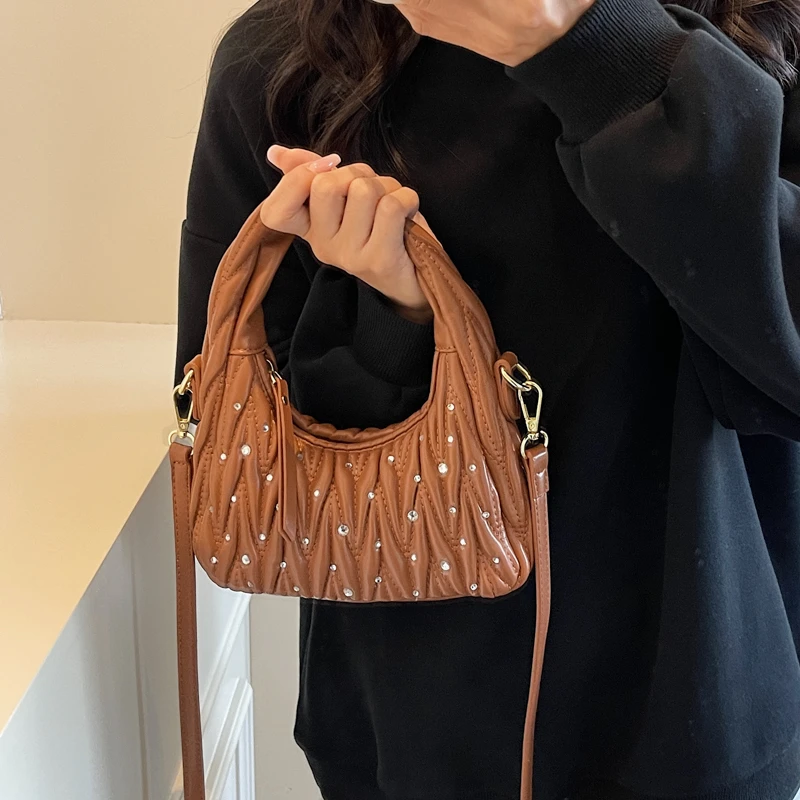 新款女包休闲单肩斜跨包女包腋下百搭小众饺子包洋气手提包法棍包