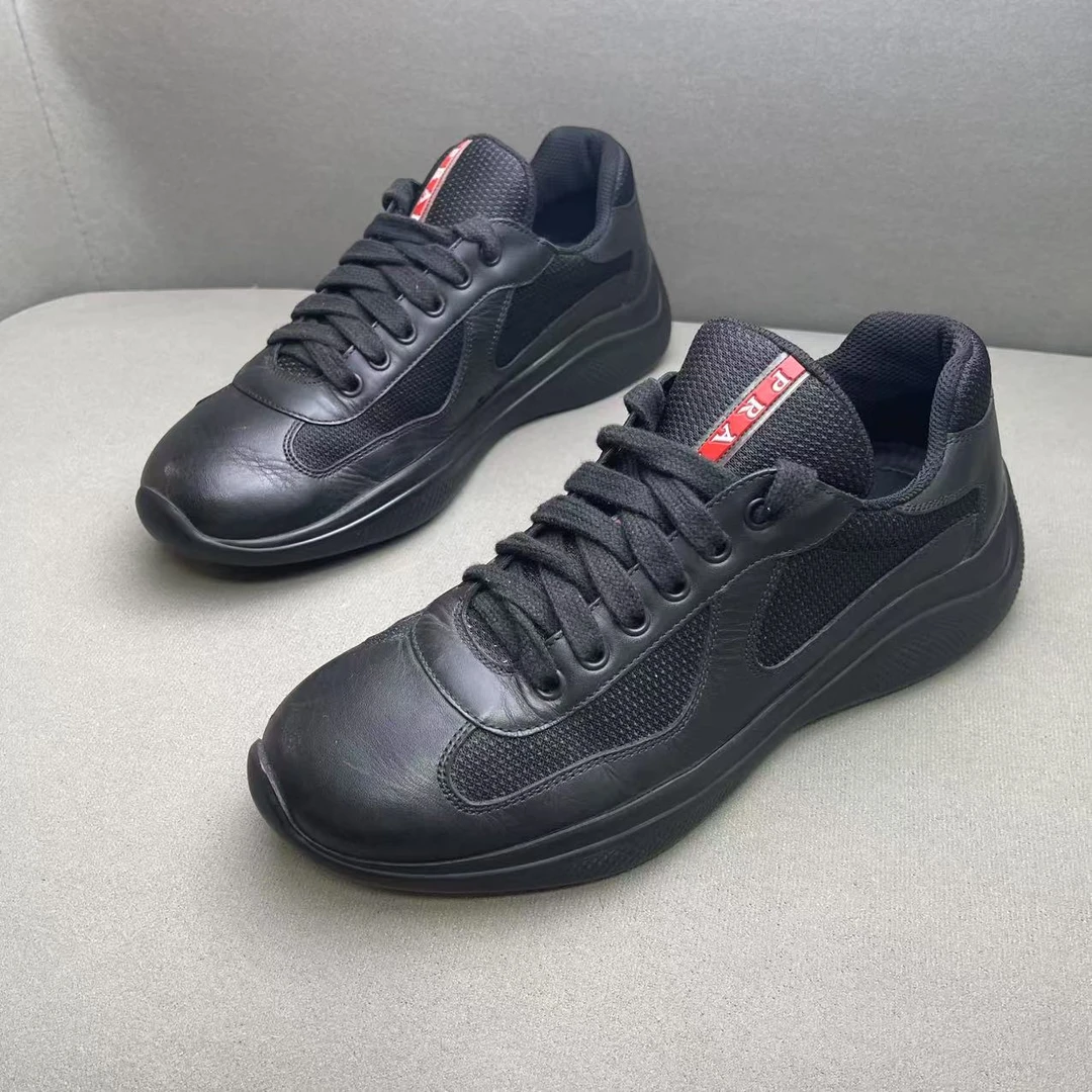 95新 Prada/普拉达 黑色时尚百搭皮革网面拼接红标运动鞋 39码