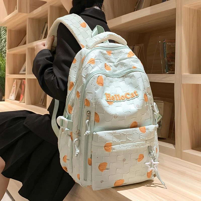 大容量书包初中女生高中大学生印花背包小学生2025新款春游双肩包