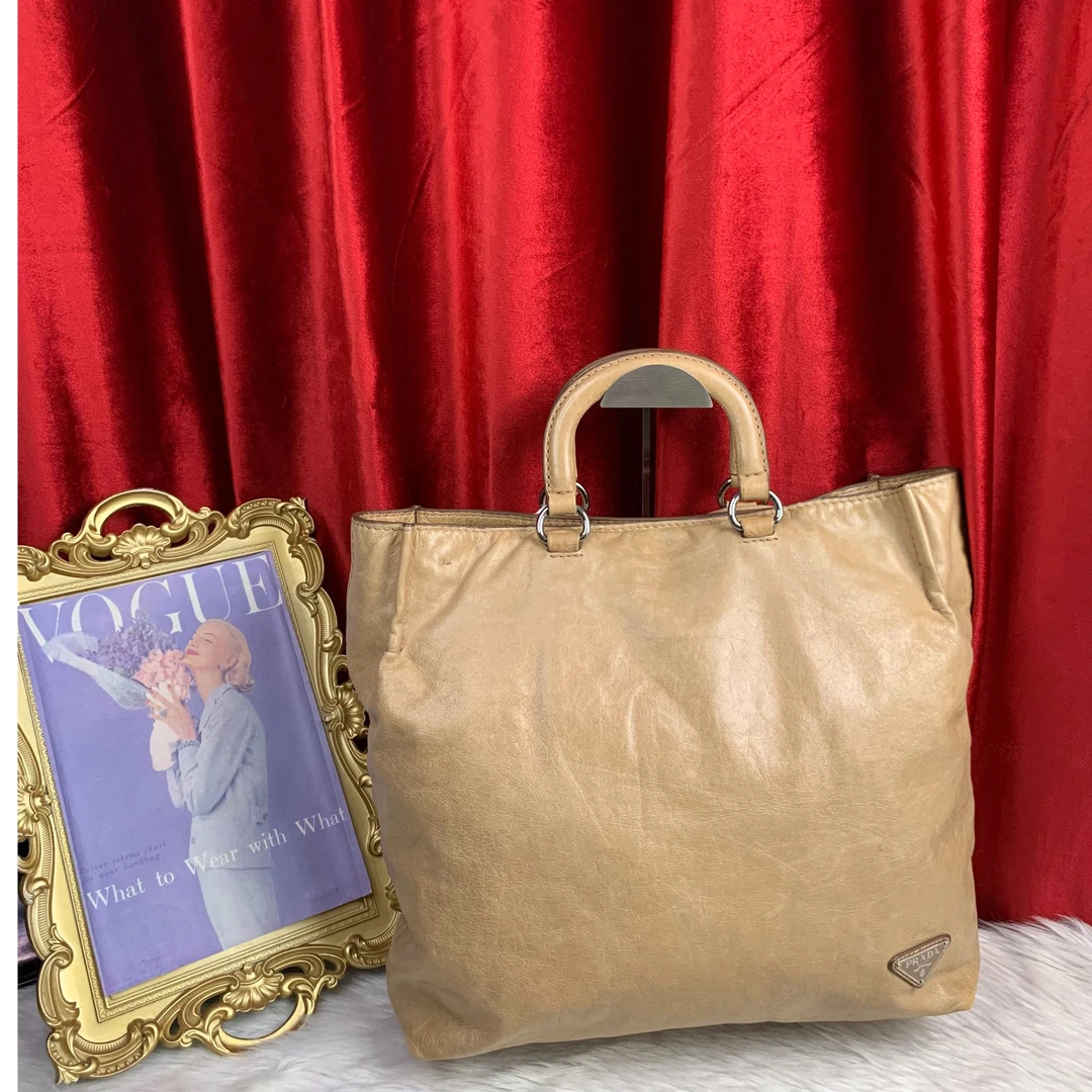 95新 Prada/普拉达 奶茶色手提包/XS10713079/3079
