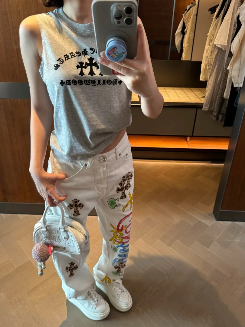 潮流时尚直筒涂鸦拼皮水洗牛仔裤男女同款