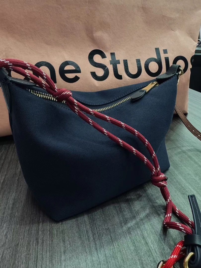 深蓝布配皮帆布包牛仔蓝色时尚休闲百搭女士