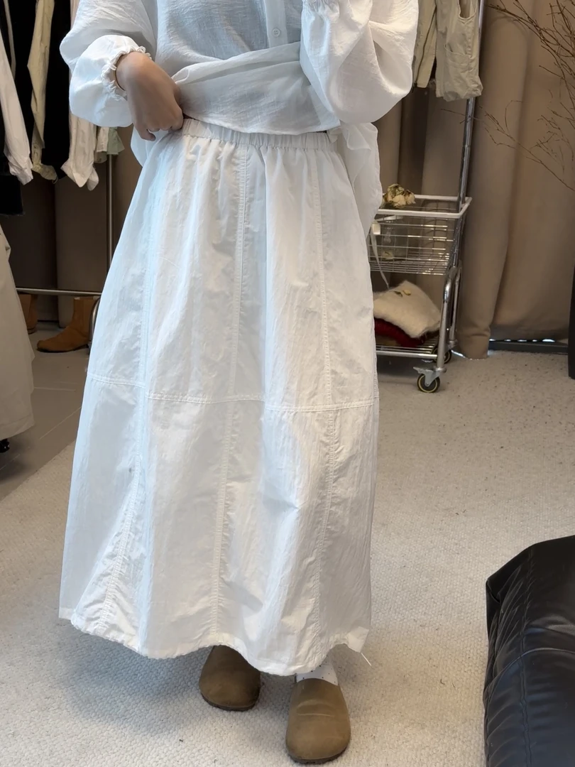 【松弛有度】花财家宽松百搭显瘦简约松紧腰下摆抽绳A字半身裙