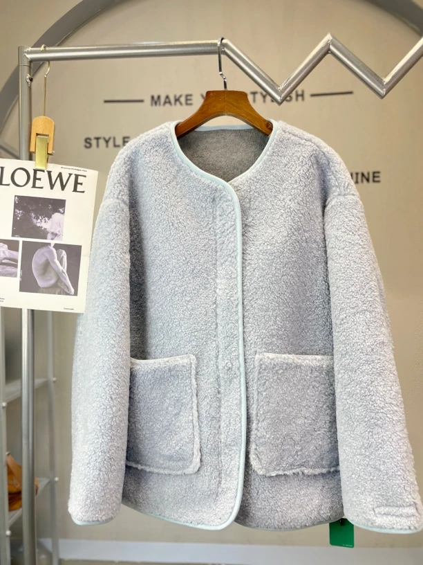 君家双色颗粒双口袋外套