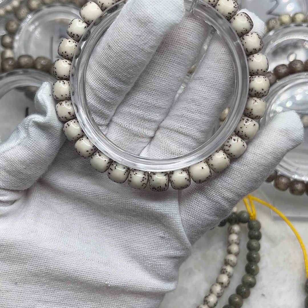 一***阿手串星月菩提粉背河豚