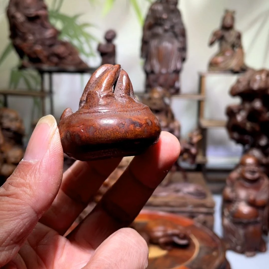 竹竹根雕必起手把剑。