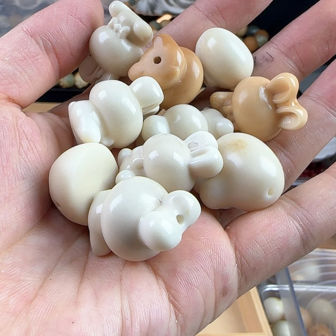 菩提根/象牙果吊坠这****?瑕疵兔子10颗有裂坏