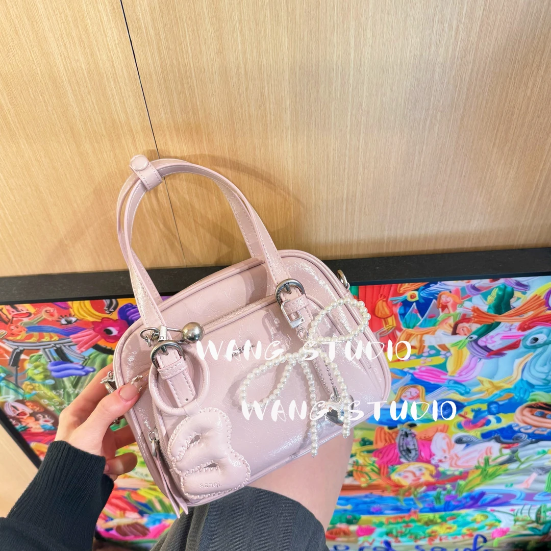 调调包包WANG STUDIO【SANQITIME 小众设计款 粉紫色口袋相机包】