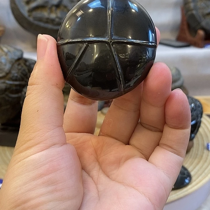菲***家石材龟纹石手把件