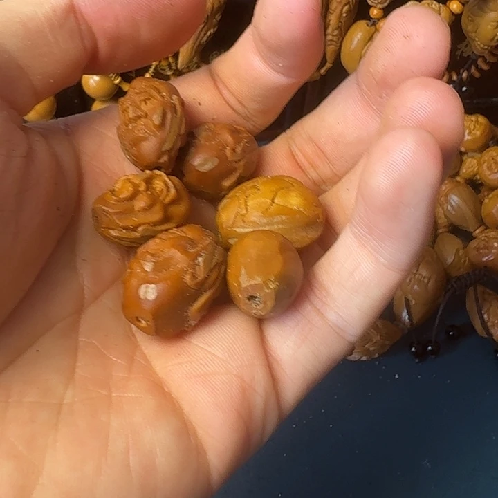 橄榄核吊坠啦啦啦啦