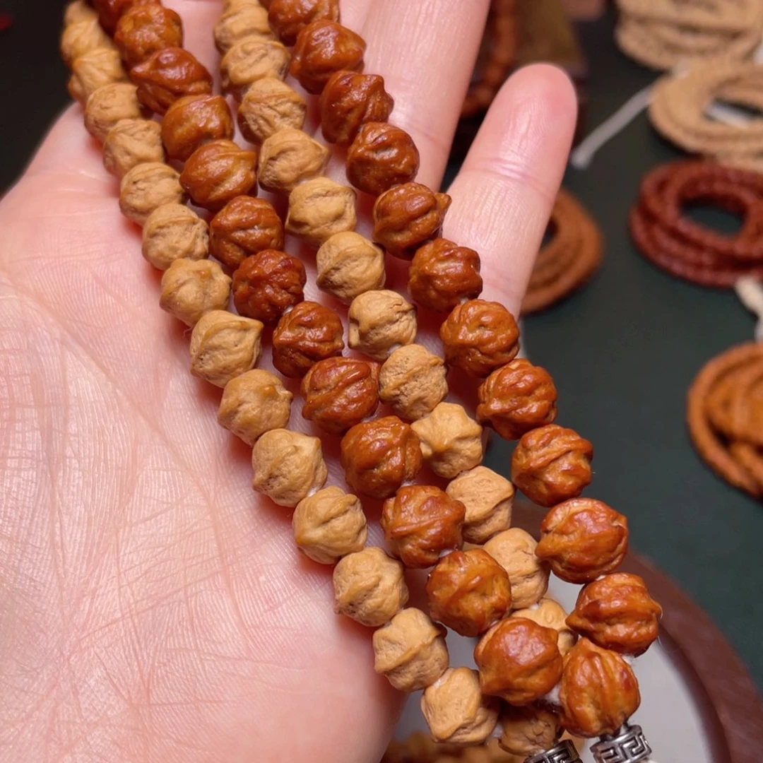 柏香籽/百香籽吊坠白牙横打手持