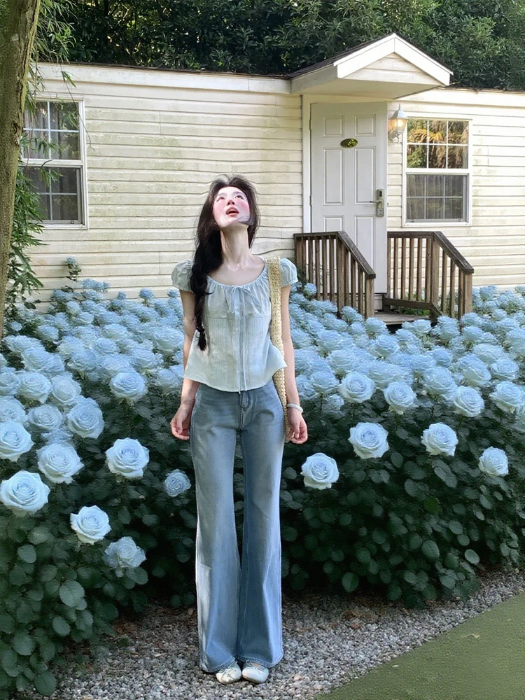 今年流行温柔风韩系收腰蓝色小衫上衣搭配牛仔裤两件套装显瘦衬衣