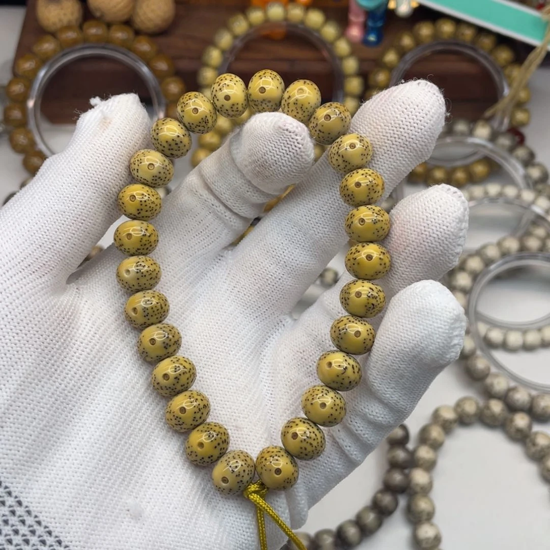 星月菩提手串10×8鸡油黄手持A28