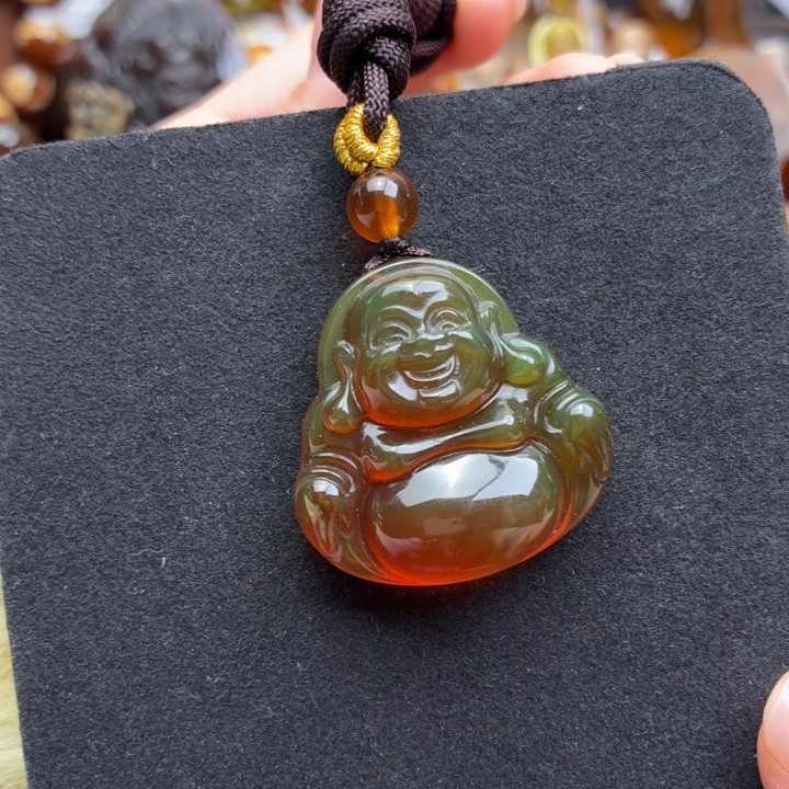 琥珀未镶嵌珠宝奇石35mm橘蜜变色佛公（10.5克
