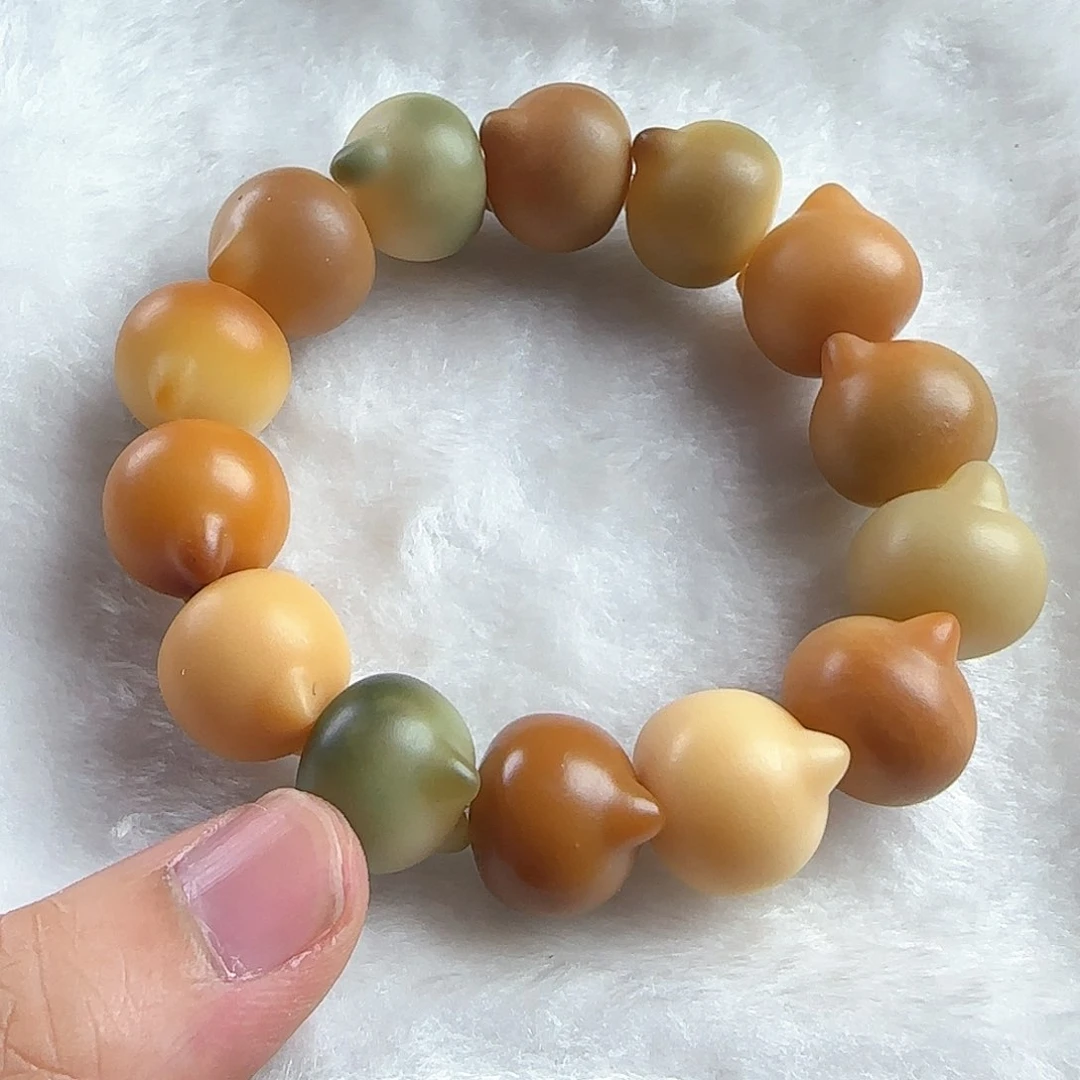 菩提根/象牙果手串?****?瑕疵卡18猫头手串一条