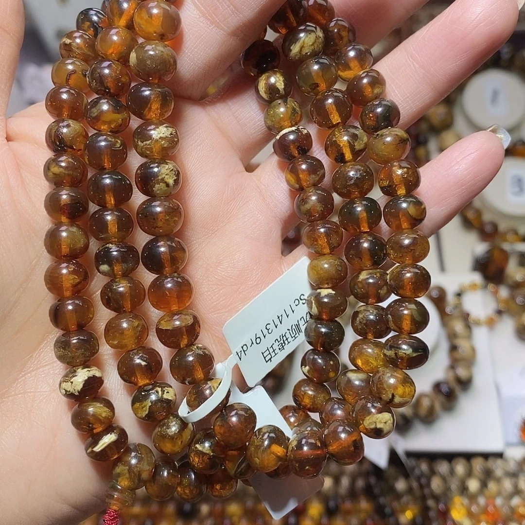 哆****琥珀未镶嵌裸石 蜡花8+
