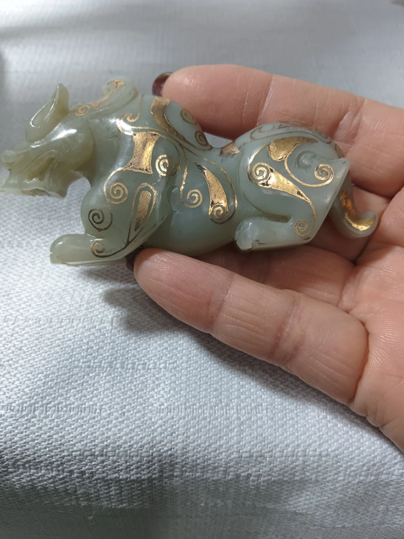 和田玉手把件一件