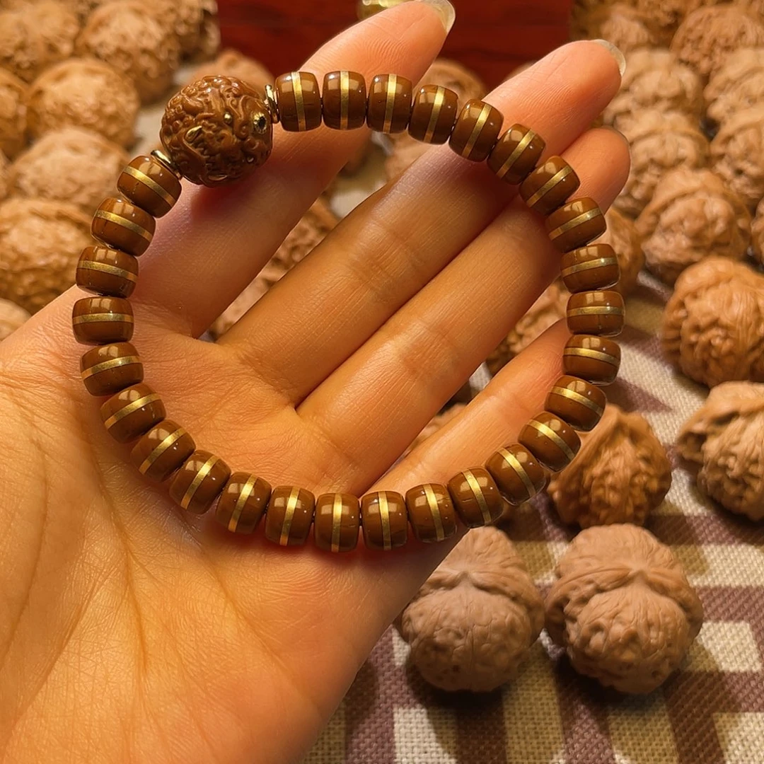文玩核桃把件弄***杯紫金鼠