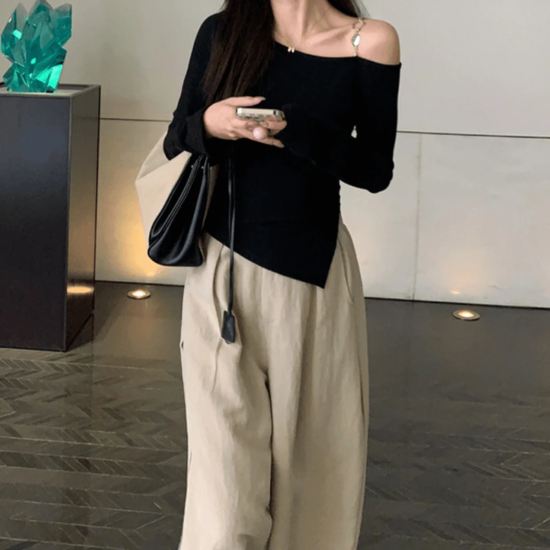 辣妹露肩黑色长袖T恤女2025春装新款不规则设计感短款上衣服5035