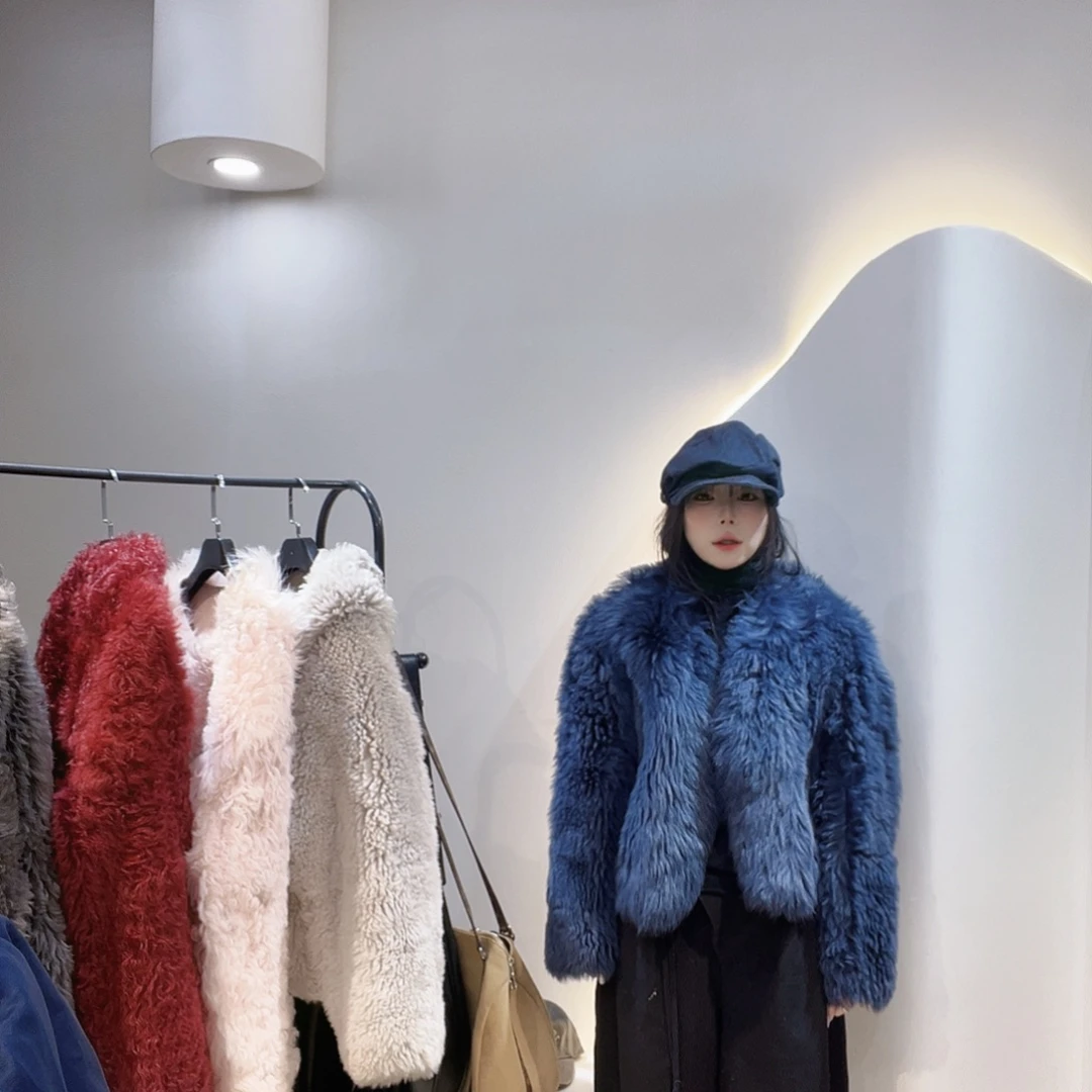 真皮皮毛一体外套223-3448。120斤内